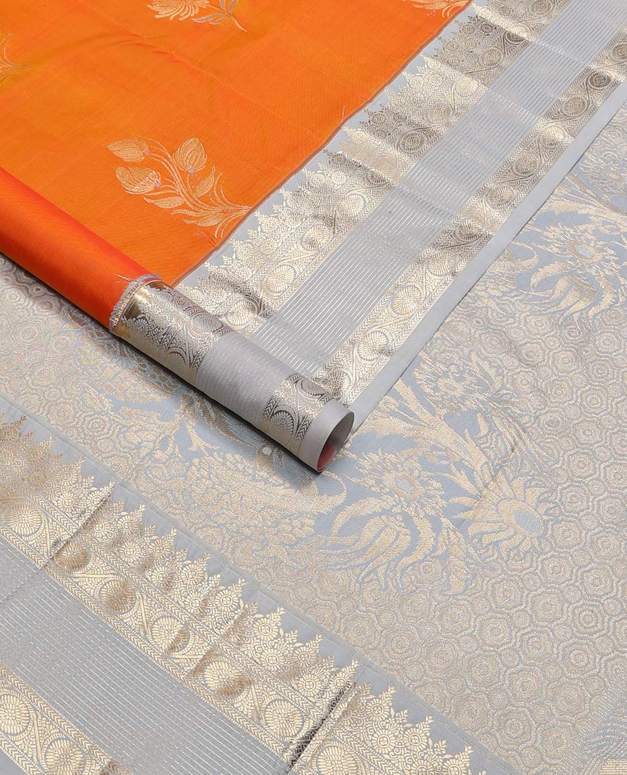 Orange flower motifs vasundhara elite silk saree with contrast inricate zari design border & floral design pallu