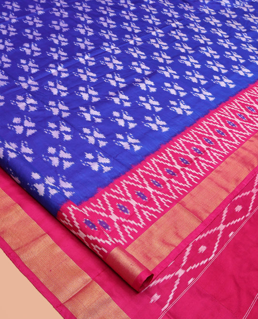 Royal Blue Pochampally Ikat Silk Saree, Adorned with Ikkat Buttas on Its Body, Complemented by a Contrast Ikkat-Style Woven Border, Pallu of Butta Enclosed Jaal Design, and Paired with a Contrast Blouse