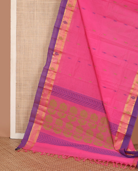 Pink buttas Kanchi cotton saree, contrast zari border, and pallu of floral designs