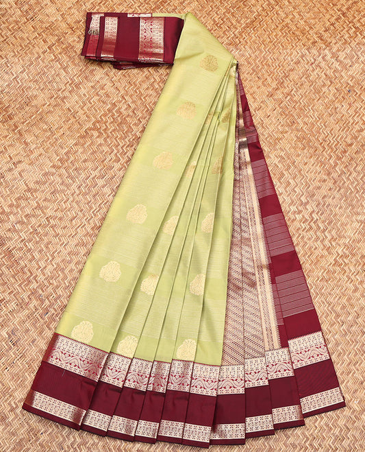 Green Budget Silk Saree, Dazzled with Zari Buttas and Stripes All Over Its Body, Complemented by a Contrast Traditional Zari Design Border, Contrast Pallu of Diagonal Designs, and Paired with a Contrast Blouse