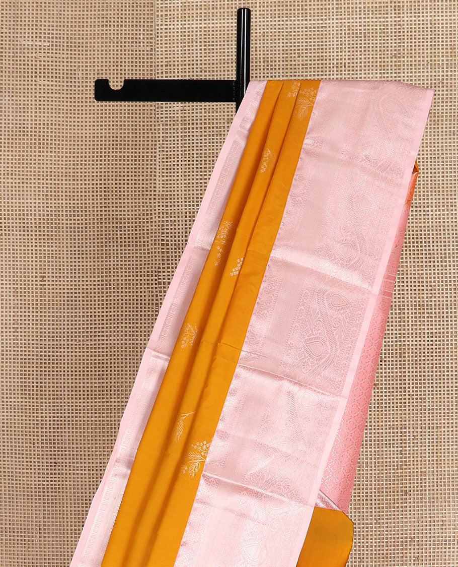 Yellow zari buttas gift saree, contrast traditional zari border, and pallu of ogee pattern