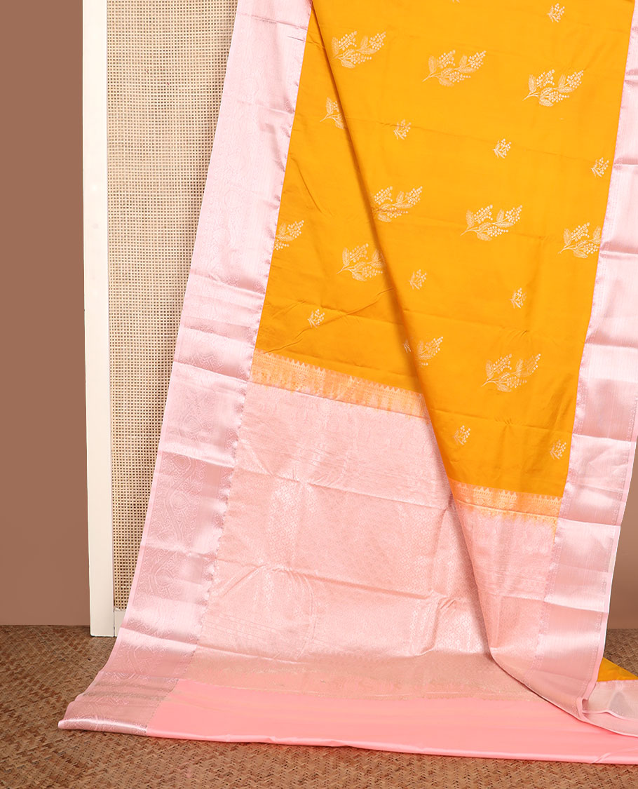 Yellow zari buttas gift saree, contrast traditional zari border, and pallu of ogee pattern