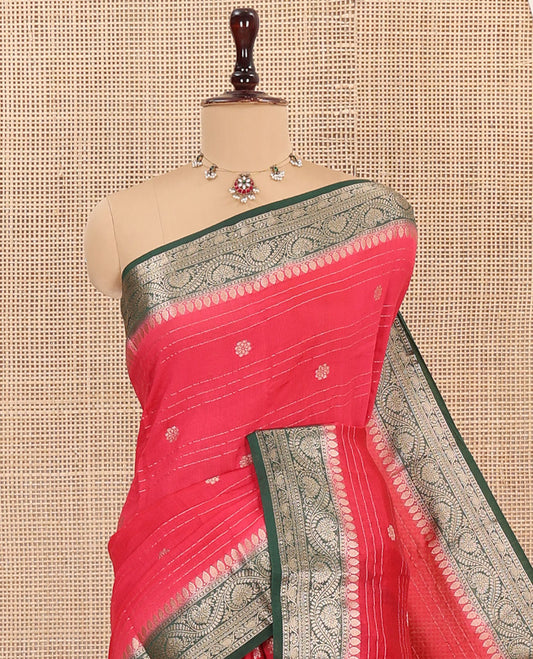 Red Assam Silk Saree, Embellished with Zari Stripes and Zari Buttas, Complemented by Contrast Zari Border of Floral Creeper Designs, Pallu Depicts Zari Designs, and Paired with a Contrast Blouse