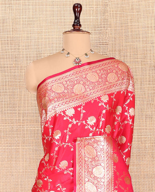 Red Banarasi Nylon Saree, Spotlighted with Floral Jaal Jacquard, a Floral Creeper Zari Border, Intricate Pallu, and a Matching Blouse