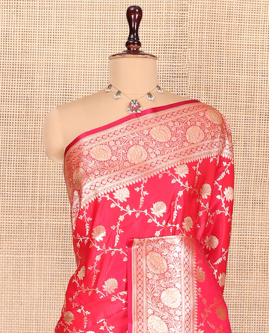Red Banarasi Nylon Saree, Spotlighted with Floral Jaal Jacquard, a Floral Creeper Zari Border, Intricate Pallu, and a Matching Blouse