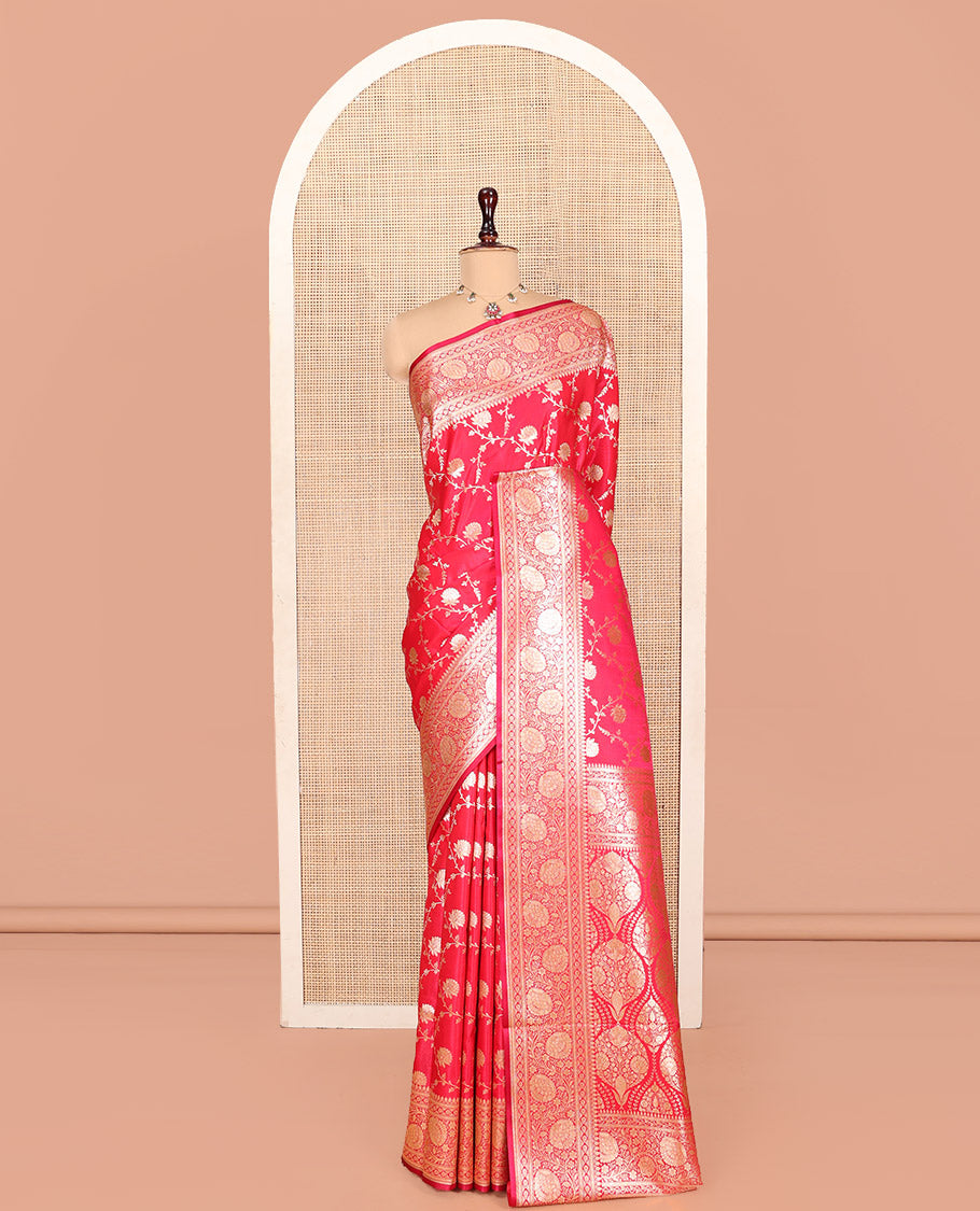 Red Banarasi Nylon Saree, Spotlighted with Floral Jaal Jacquard, a Floral Creeper Zari Border, Intricate Pallu, and a Matching Blouse