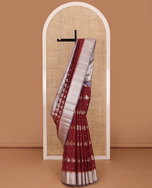 Maroon floral meena buttas raw mango silk saree, contrast floral ogee patterned border, and floral design pallu