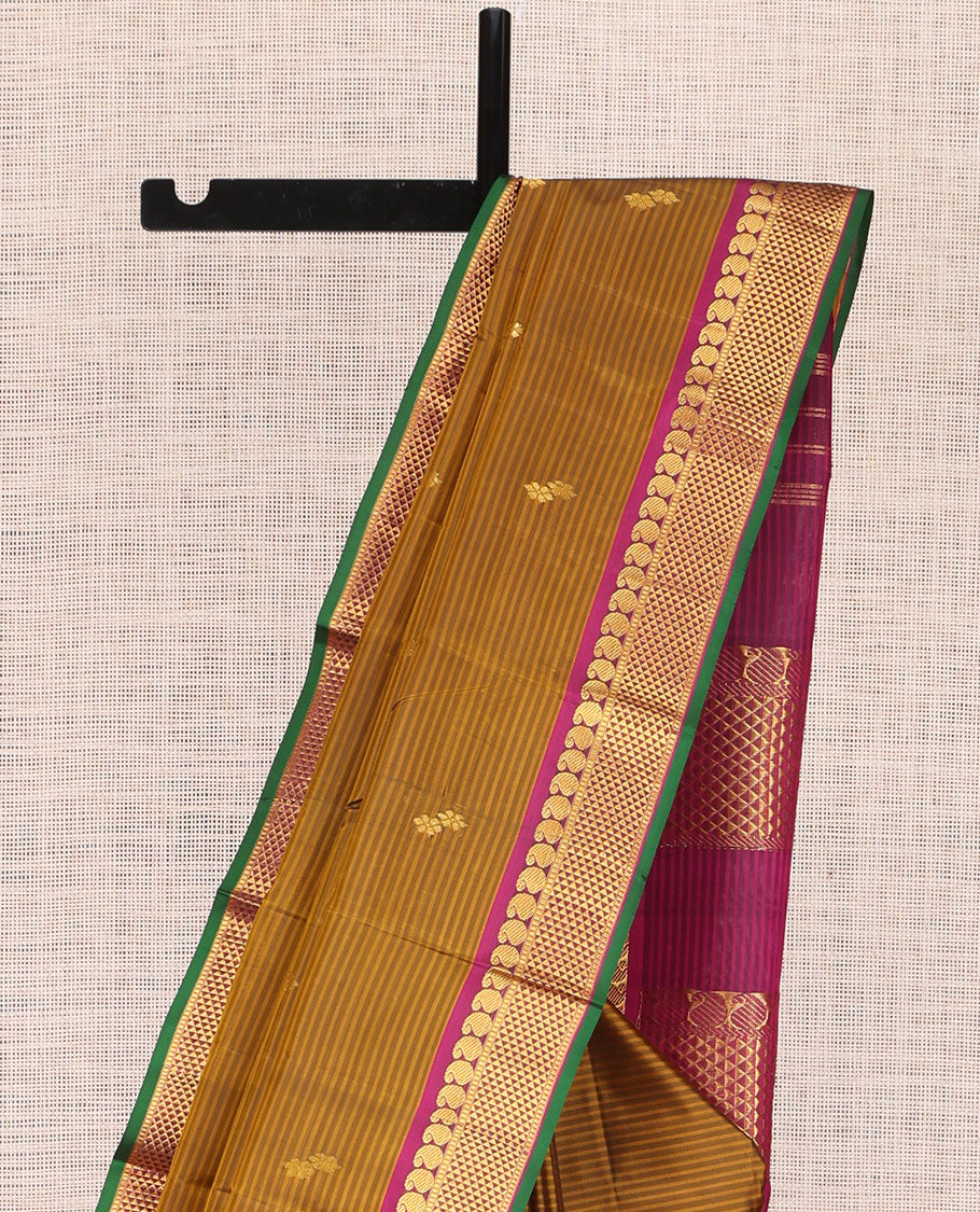Brown Kanchipuram Silk Saree, Elevated with Vazhaipoo Stipes and Zari Buttas, a Contrast Ara Madam and Manga Motif Border, Pallu of Zari Design, and Contrast Blouse