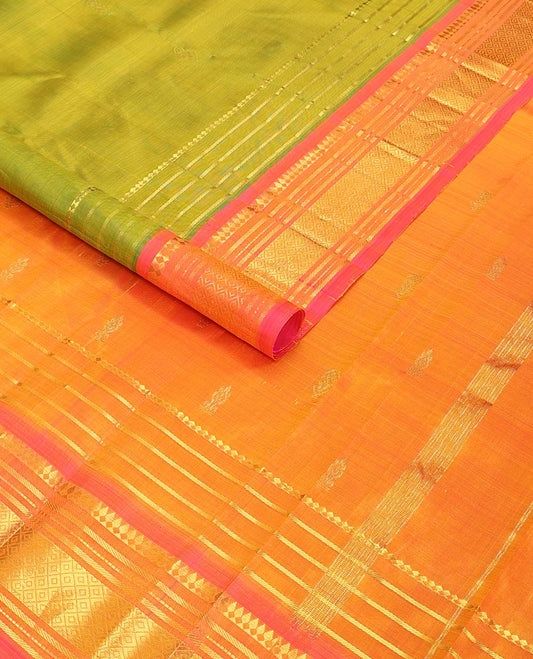 Green buttas kancheepuram silk saree with contrast border of rekku, muthu, banaras, geometric design & floral buttas  pallu