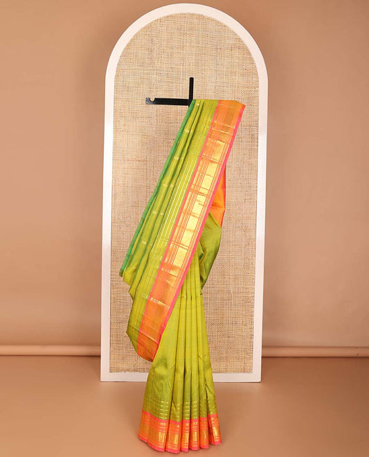 Green buttas kancheepuram silk saree with contrast border of rekku, muthu, banaras, geometric design & floral buttas  pallu