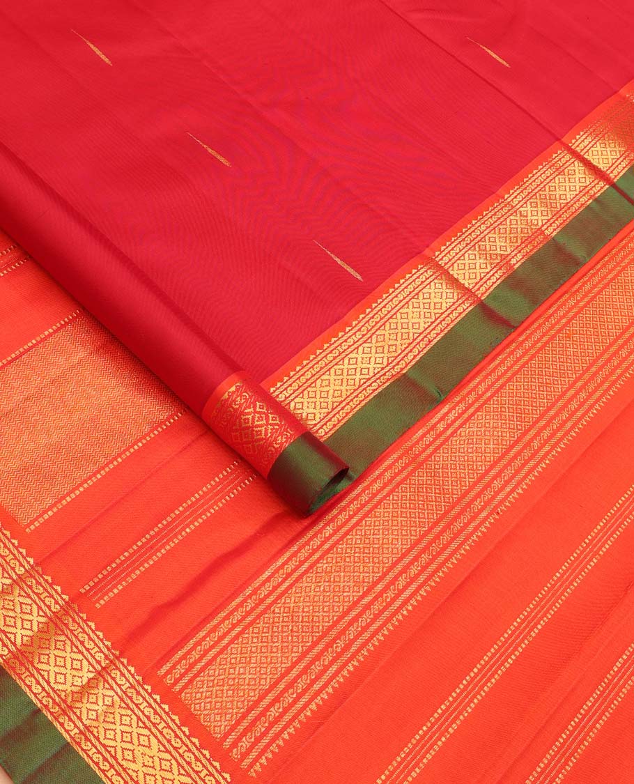 Red malli mokku buttas Kanchipuram silk saree, contrast border of rekku, banaras, and mayil kann designs, and traditional design pallu
