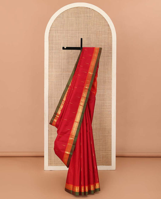 Red malli mokku buttas Kanchipuram silk saree, contrast border of rekku, banaras, and mayil kann designs, and traditional design pallu