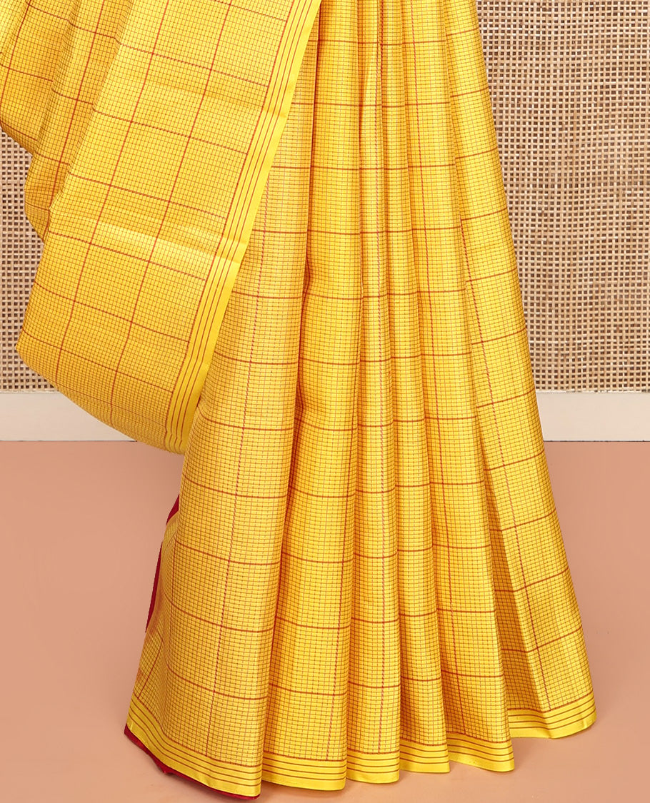 Borderless Yellow Mayuri Soft Silk Saree, Statement with Bold Checked Design On Its Body, Complemented by Contrast Temple Zari Woven Pallu and Paired with a Contrast Blouse