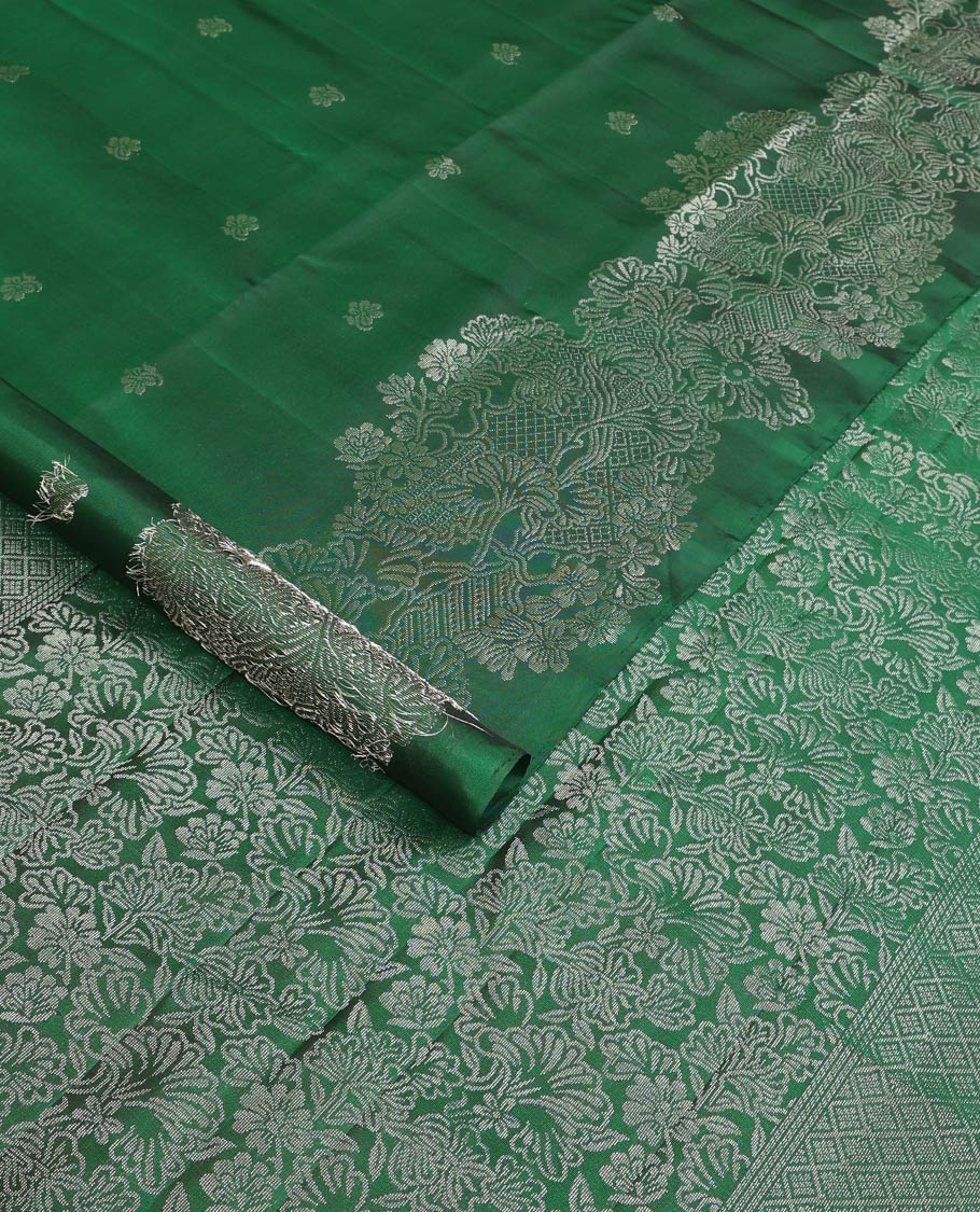 Green floral zari buttas soft silk saree, floral vine border, and pallu of floral designs