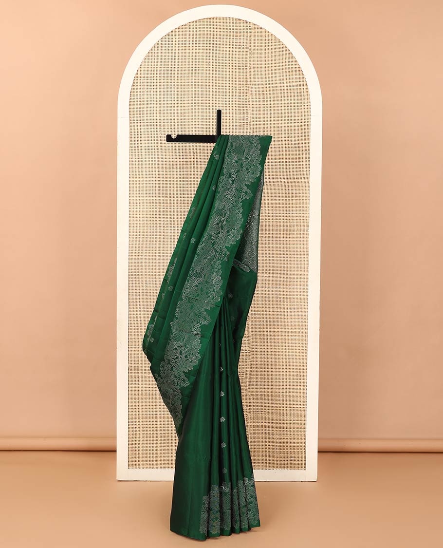 Green floral zari buttas soft silk saree, floral vine border, and pallu of floral designs