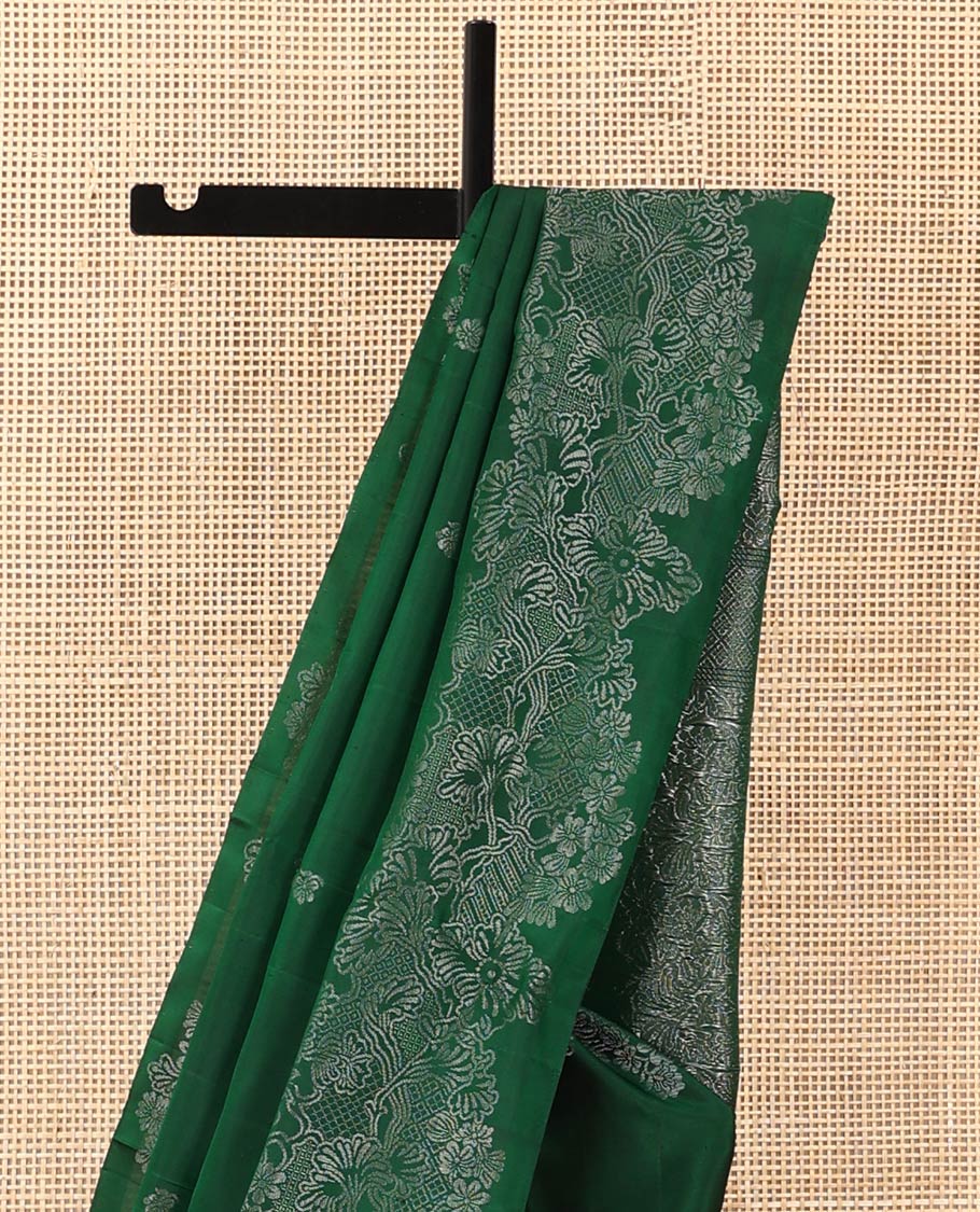 Green floral zari buttas soft silk saree, floral vine border, and pallu of floral designs
