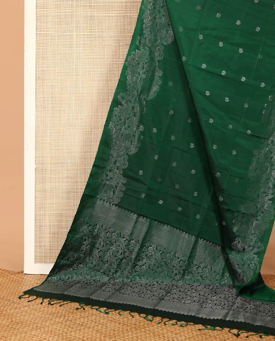 Green floral zari buttas soft silk saree, floral vine border, and pallu of floral designs