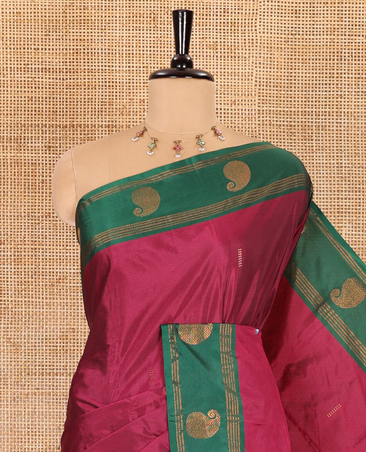 Purple zari buttas semi-soft silk saree, contrast border of stripes, and paisley buttas, zari buttas pallu, and a matching blouse