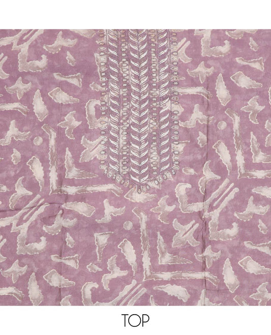 Lavender material chudidar set, uniquely printed with neck self color thread embroidered top, plain bottom and sequins embroidered dupatta