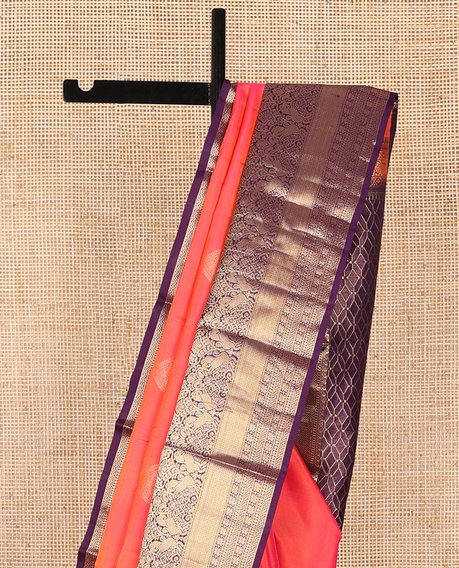 Peach buttas silk saree with contrast border of thilakam, mokku, muthu, banaras design & argyle design pallu