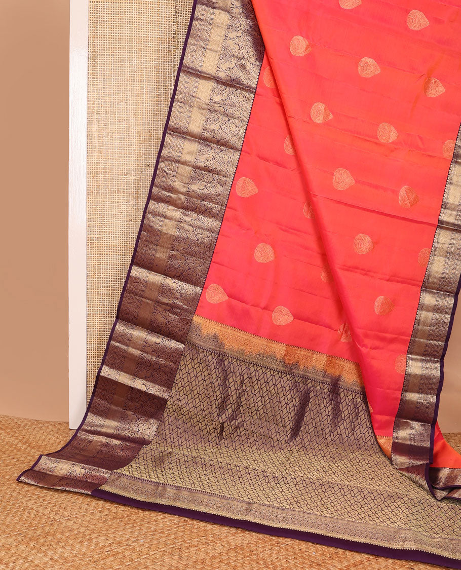 Peach buttas silk saree with contrast border of thilakam, mokku, muthu, banaras design & argyle design pallu
