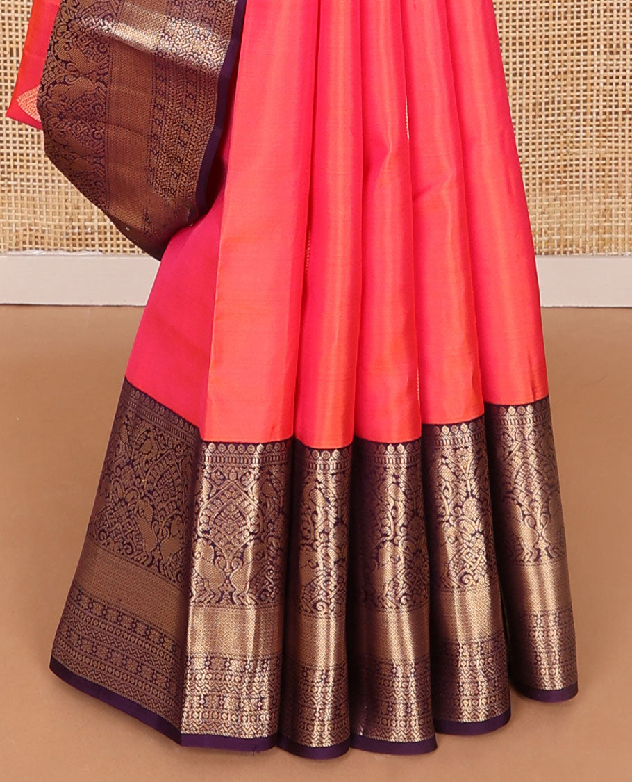 Peach buttas silk saree with contrast border of thilakam, mokku, muthu, banaras design & argyle design pallu