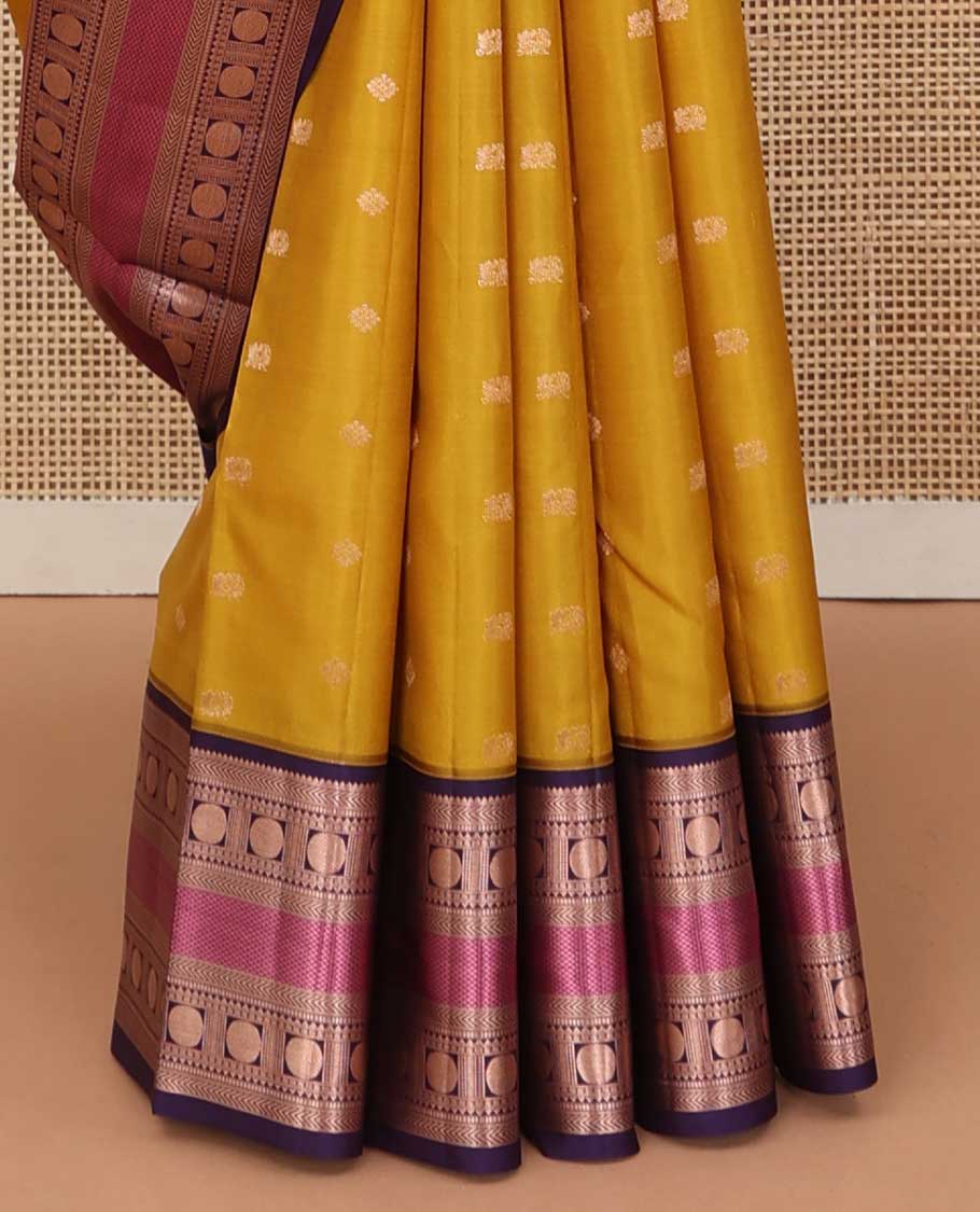 Yellow zari buttas silk saree, contrast border of thilakam,kathir, rudraksham, and mayil kann, and jaal pallu