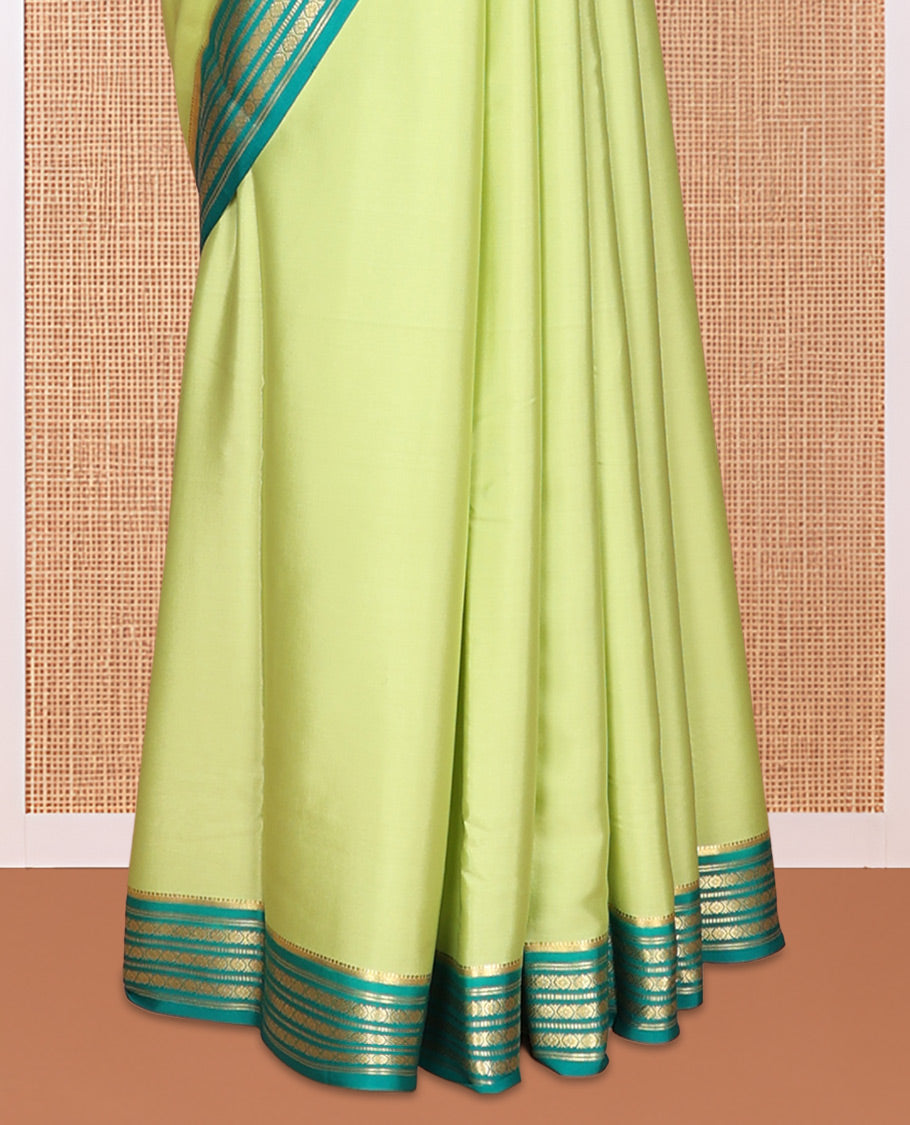 Green Plain Mysore Silk Saree, Complemented by a Contrast Traditional Zari Border, Zari Design Pallu, and a Contrast Blouse