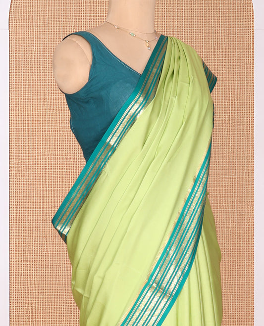 Green Plain Mysore Silk Saree, Complemented by a Contrast Traditional Zari Border, Zari Design Pallu, and a Contrast Blouse