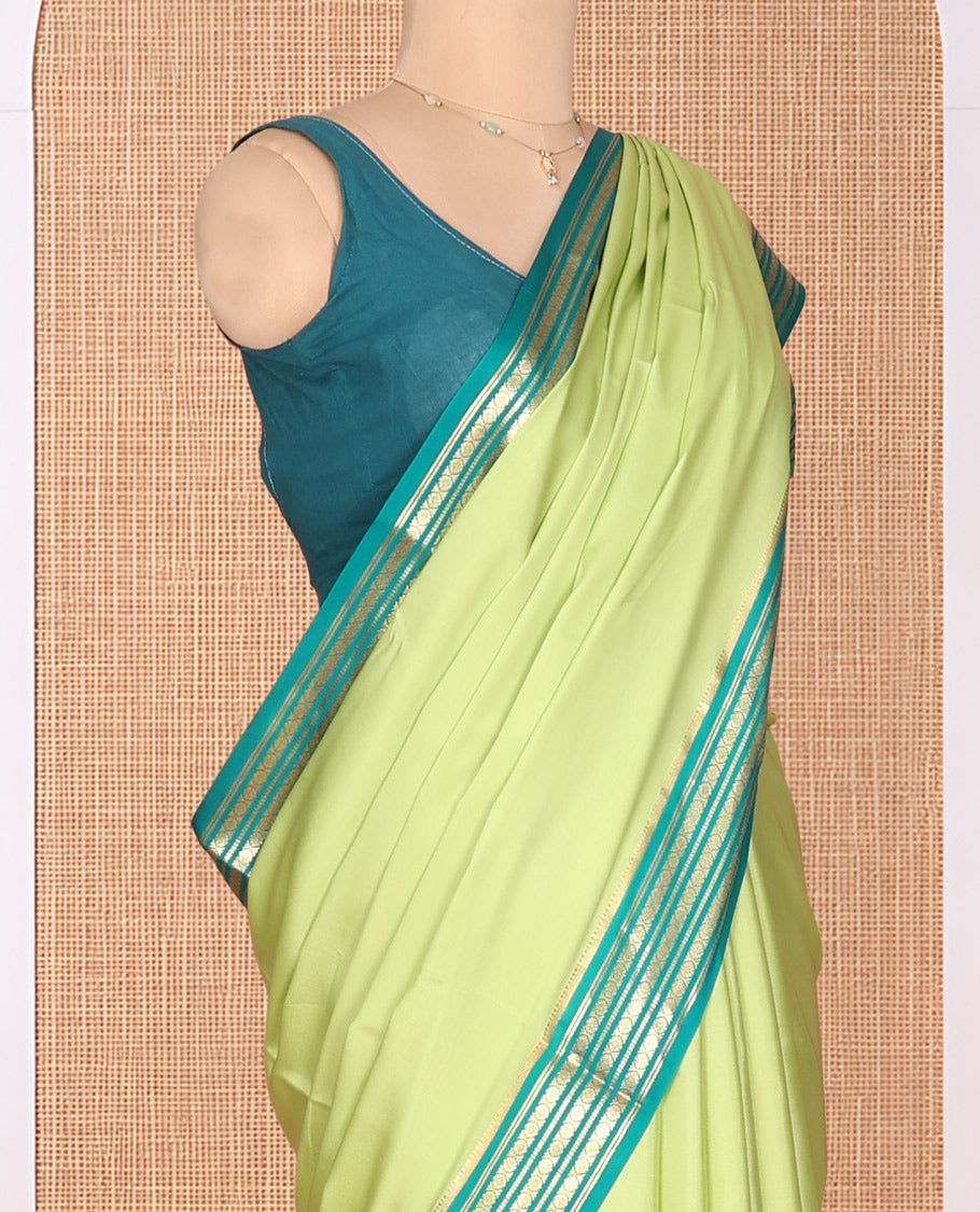 Green Plain Mysore Silk Saree, Complemented by a Contrast Traditional Zari Border, Zari Design Pallu, and a Contrast Blouse