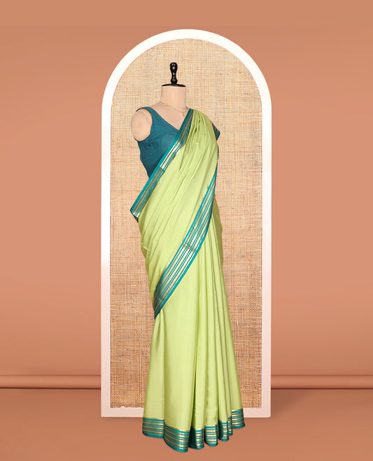 Green Plain Mysore Silk Saree, Complemented by a Contrast Traditional Zari Border, Zari Design Pallu, and a Contrast Blouse
