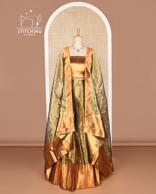Brown buttas tissue half saree with contrast zari design border, floral design blouse & floral design dhavani