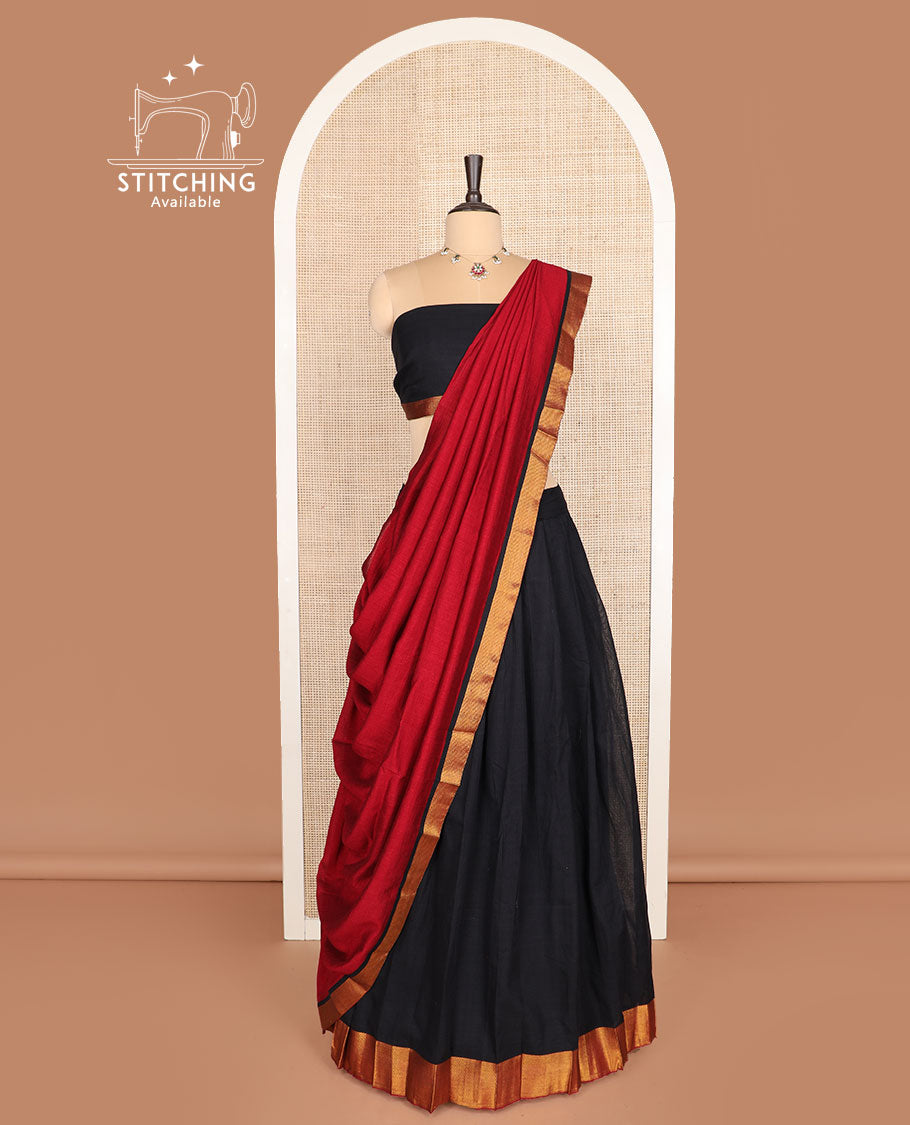 Black cotton half-saree, plain with zari bordered skirt, matching blouse, and a contrast zari bordered dhavani