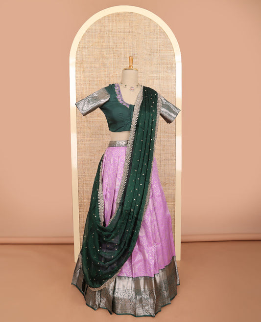 Light pink floral jacquard half saree with contrast zari design border, floral embroidered blouse & floral embroidery dhavani