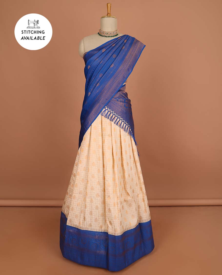 Cream checked , floral design half saree with contrast border, zari design blouse & striped , floral dhavani