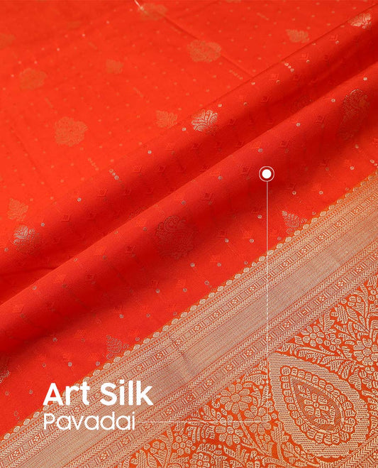 Orange art silk pavadai material, zari buttas with embossed contrast traditional zari border skirt, and matching blouse