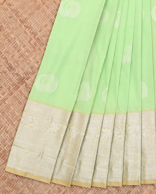 Green Budget Silk Saree, Subtly Sparkled with Buttas All Over Its Body, Complemented by a Contrast Traditional Zari Design Border, Grand Pallu, and Paired with a Contrast Blouse