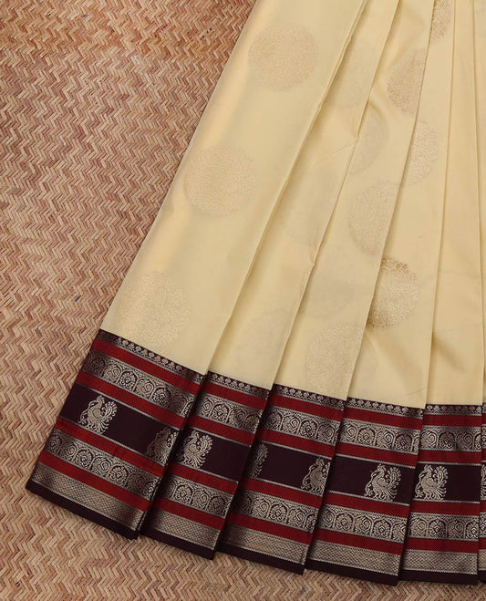 Cream Budget Silk Saree, Sparsely Woven with Buttas All Over Its Body, Complemented by Contrast Traditional Zari Designs Woven Border, Grand Jaal Pallu and Paired with a Contrast Blouse