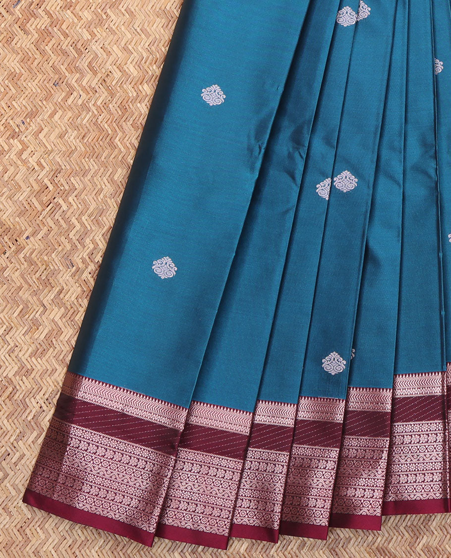 Blue Budget Silk Saree, Gracefully Embellished with Zari Buttas All Over Its Body, Complemented by a Contrast Traditional Zari Design Border, Geometric-Patterned Pallu, and Paired with a Contrast Blouse