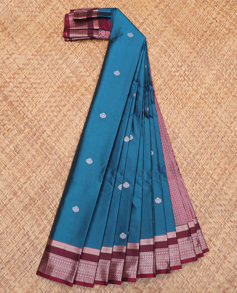 Blue Budget Silk Saree, Gracefully Embellished with Zari Buttas All Over Its Body, Complemented by a Contrast Traditional Zari Design Border, Geometric-Patterned Pallu, and Paired with a Contrast Blouse