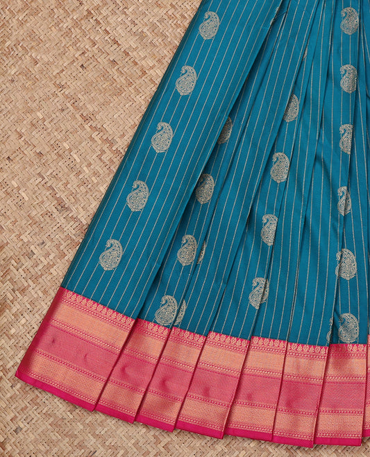 Blue Budget Silk Saree, Accentuated with Paisley Buttas and Stripes All Over Its Body, Complemented by a Contrast Traditional Zari Border, Grand Pallu, and Paired with a Contrast Blouse