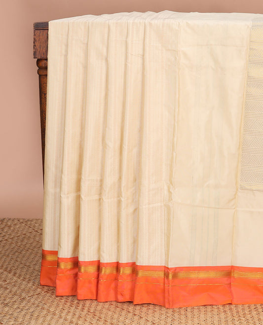 Cream striped gift saree with contrast zari design & geometric design pallu