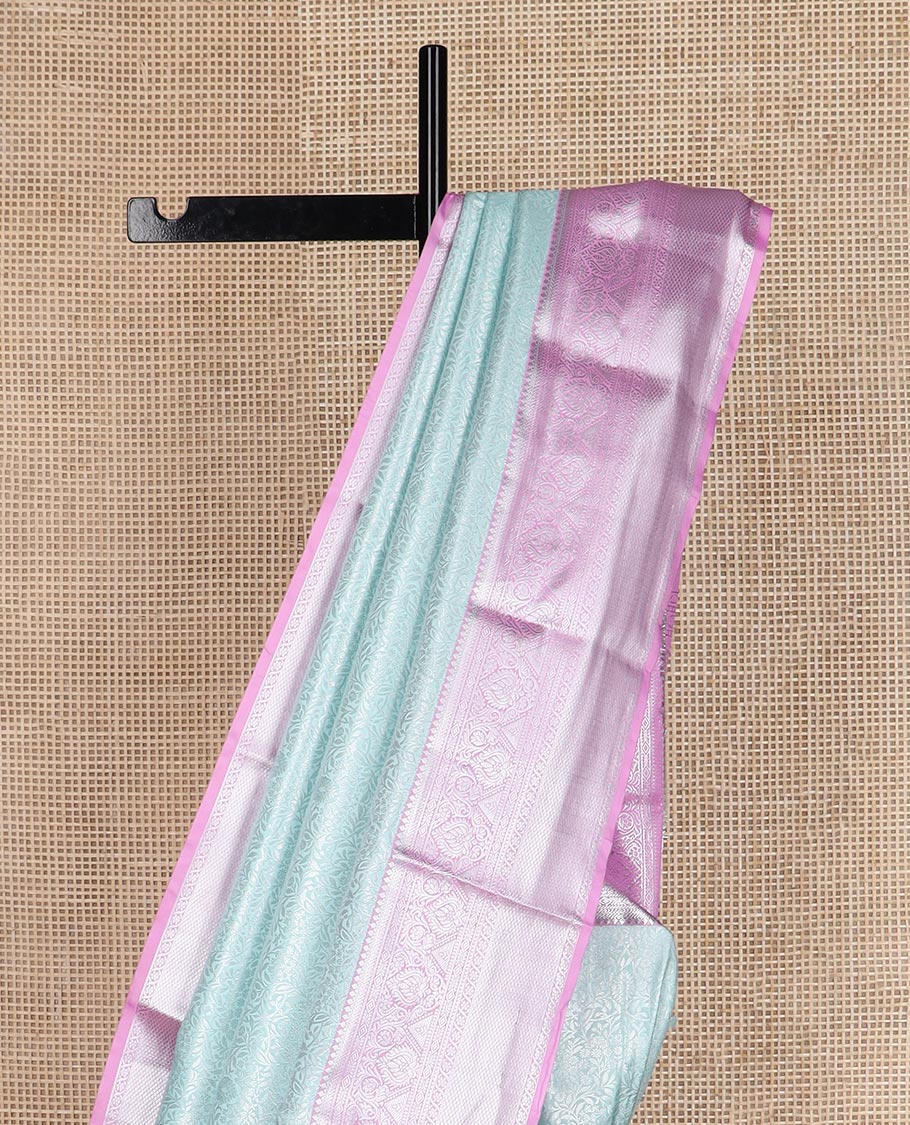 Powder blue floral vine jacquard budget silk saree, contrast traditional zari border, and zari rich pallu