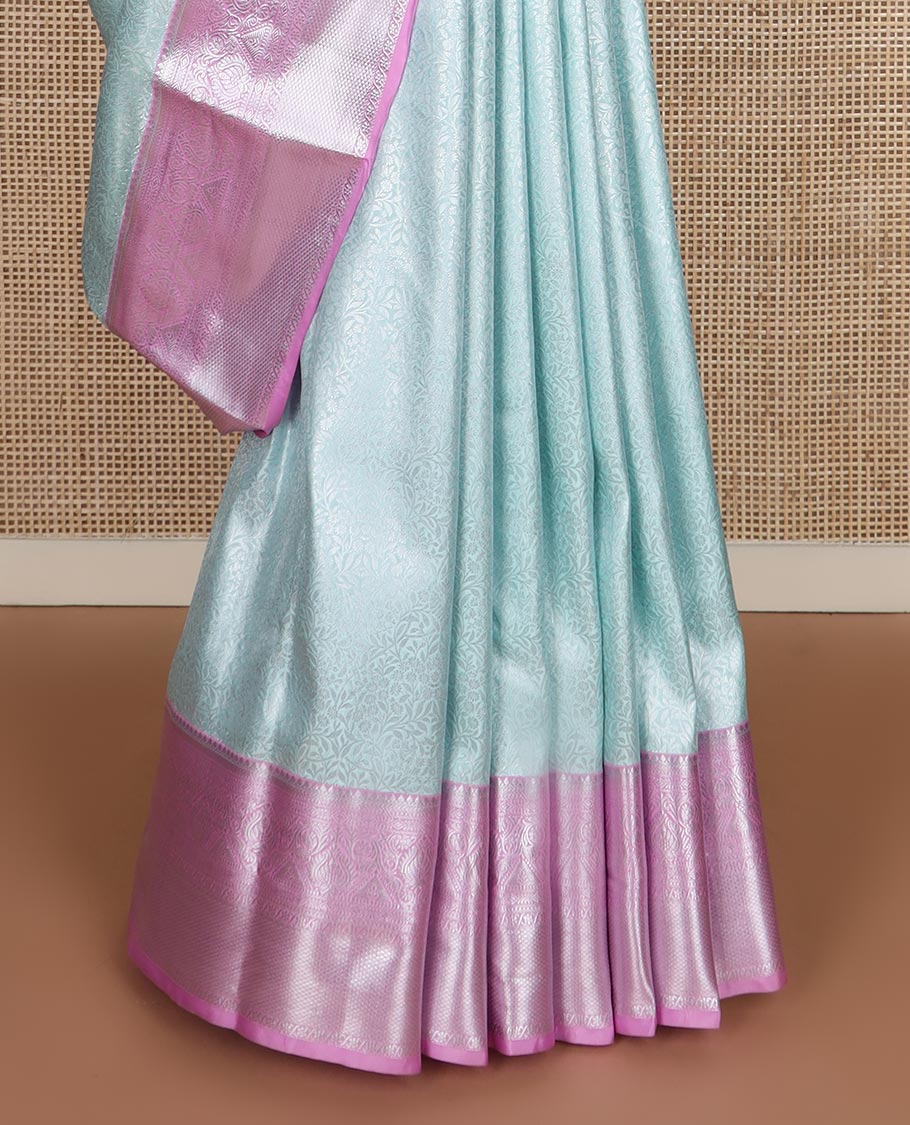 Powder blue floral vine jacquard budget silk saree, contrast traditional zari border, and zari rich pallu