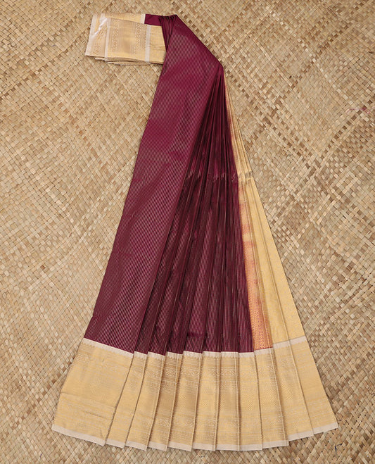 Maroon Budget Silk Saree Elevated with Dotted Zari Stripes, Complemented with a Contrast Traditional Zari Design Border, Diagonal Striped Pallu, and Paired with a Contrast Blouse