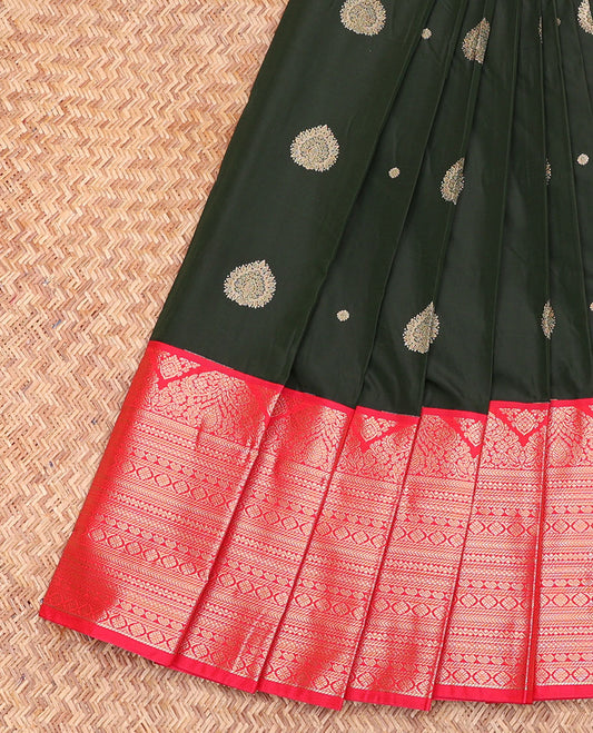Deep Green Budget Silk Saree, Showcasing Zari Buttas, Complemented by a Contrast Traditional Zari Border, Pallu of Geometric Design, and a Contrast Blouse