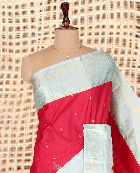 Red Budget Silk Saree, Embellished with Zari Buttas on Its Body, Complemented by a Contrast Traditional Zari Design Border, Grand Jaal Pallu, and Paired with a Contrast Blouse