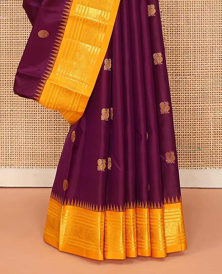 Purple peacock chakram buttas Bangalore silk saree, contrast temple traditional zari border, and pallu of traditional designs