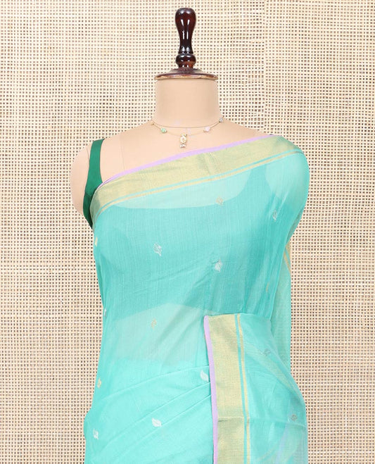 Turquoise Chanderi Cotton Saree, Enthralled with Zari Buttas All Over Its Body, Highlighted by a Zari Border, Pallu  of Zari Stripes and Floral Buttas, and Paired with a Matching Blouse