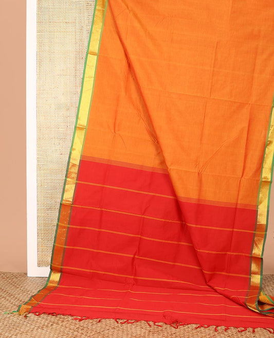 Orange Plain Poly Cotton Saree, Complemented by a Contrast Chevron Striped Zari Border, Pallu of Stripes, and Paired with a Contrast Blouse